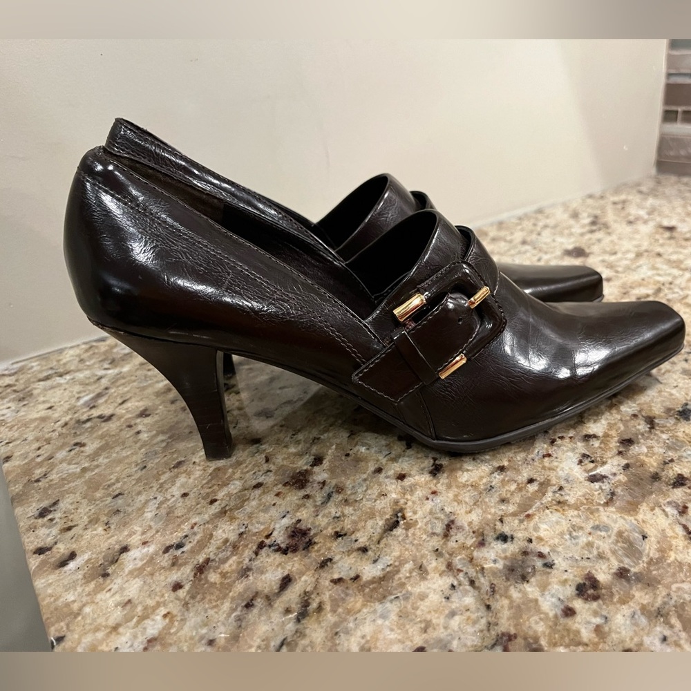 Size nine brown leather Franco Sarto shoes with two and a half inch heel